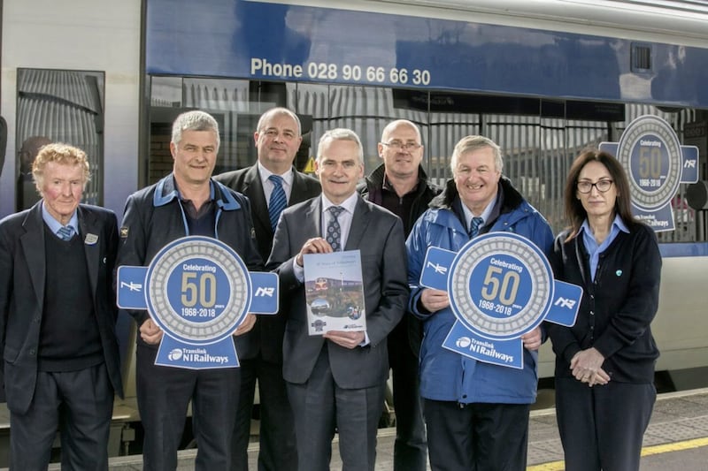 Translink Group CEO Chris Conway (centre) with NI Railways long service staff William (Billy) Patterson (L), Ian Stewart, Martin Mould, Brian Robinson, Michael McKinty and Kathleen Hamill 