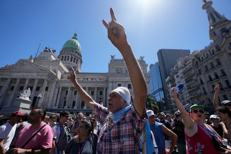 Demonstrators gather outside Congress in Buenos Aires (Natacha Pisarenko/AP)
