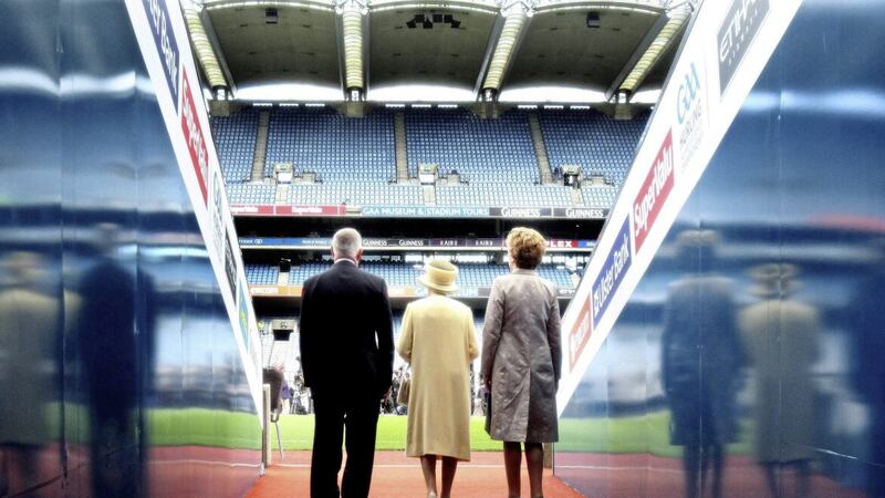 Queen Elizabeth II, President Mary McAleese and GAA President Christy Cooney walk out of the tunnel towards the pitch at Croke Park Dublin in May 2011. Photo: Maxwells/PA Wire 