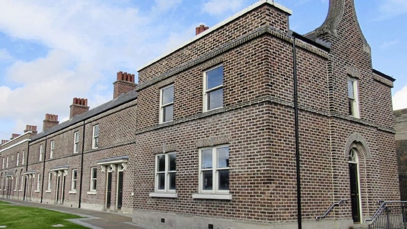 The eight former warders&#39; cottages lie just outside the historic walls of Crumlin Road Gaol 