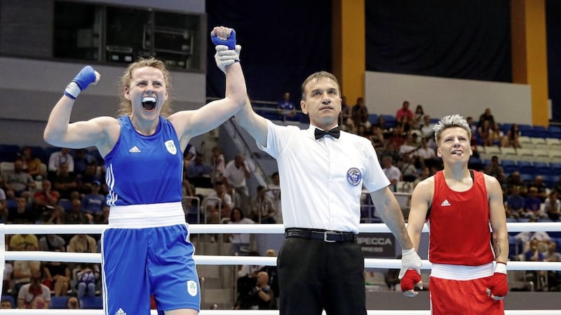 Monkstown featherweight Michaela Walsh celebrates after her win over Romania&#39;s Lenuta-Lacramioara Perijoc at the European Games yesterday. Picture by PA 