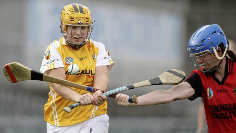 Antrim&#39;s Katie McAleese (left) and Down&#39;s Lisa McCrickard in close-quarter action during the Gala All Ireland Junior Camogie semi-final at Casement Park. Picture by John McIlwaine. 