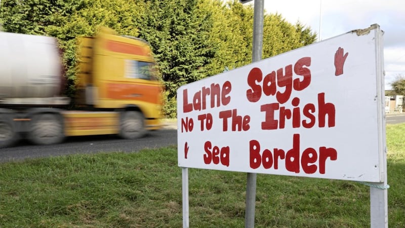 A sign on the main road on the approach to the port town of Larne protesting against the Irish Sea border imposed by Brexit 