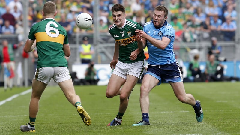Dublin's Jack McCaffrey and Kerry's Sean O'Shea  in action during the All-Ireland Senior Football Final.<br /> Picture by Philp Walsh&nbsp;