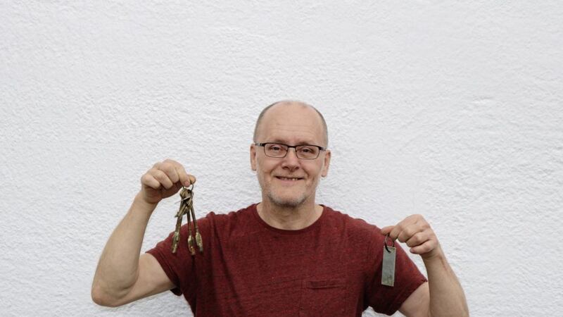 Belfast artist Raymond Watson with the keys that set him off on an artistic journey back to prison 