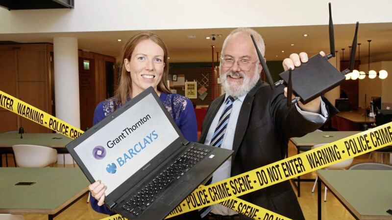 Joanna McCardle, relationship director, Barclays, and Andrew Harbison, director of forensic and investigation services at leading business advisory firm Grant Thornton, prepare to host a breakfast seminar on cyber security next month. Picture by Darren Kidd/ Press Eye 