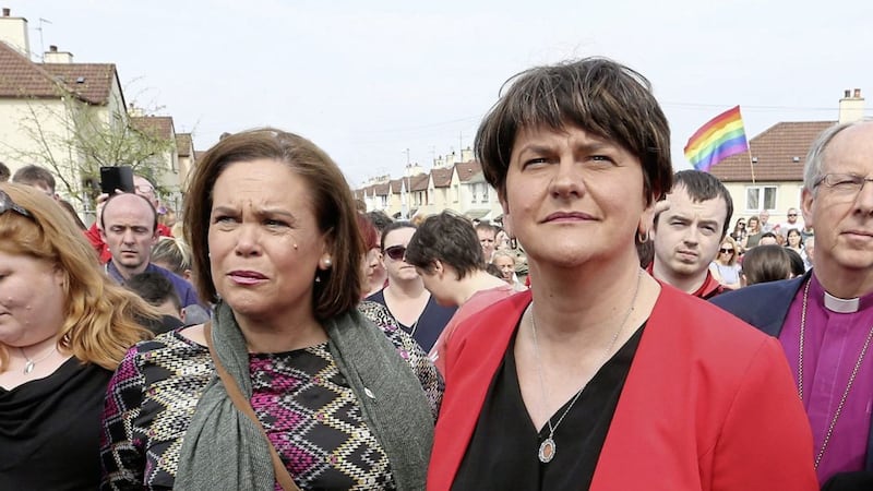 Mary Lou McDonald and leader Arlene Foster at the vigil for Lyra McKee in Derry&#39;s Creggan estate. Picture by Margaret McLaughlin 