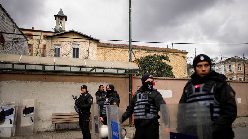 One person was killed when two masked assailants attacked a church in Istanbul during Sunday services, Turkish officials said (Emrah Gurel/AP)