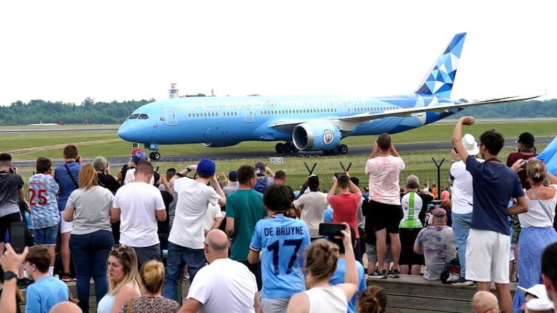 Manchester City’s players arrive at Manchester Airport after their victory (Tim Goode/PA)
