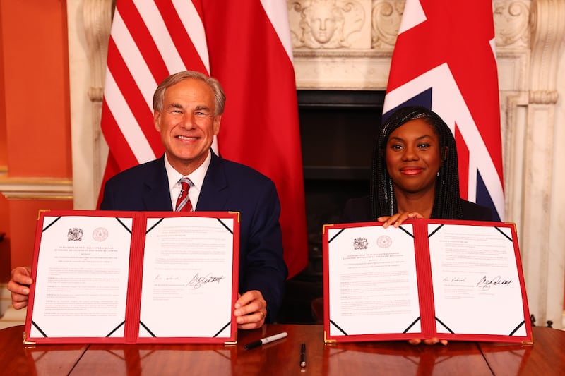 Texas Governor Greg Abbott and Business Secretary Kemi Badenoch posed for photographs with the signed agreement