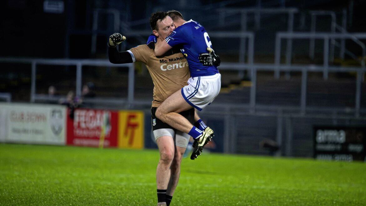 Scotstown goalkeeper Rory Beggan celebrates with team-mate Donal Morgan 