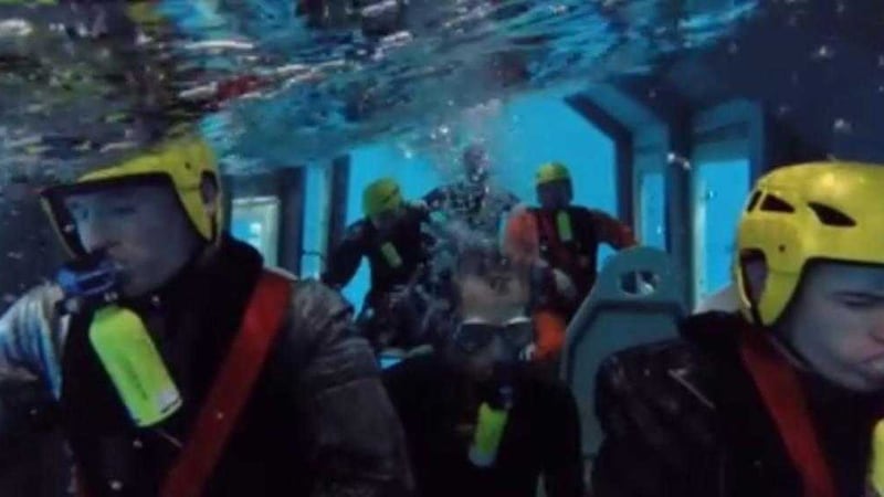 Crew members are seen submerged during a Helicopter Underwater Escape Training (HUET) drill. Picture by Irish Air Corps via Facebook  