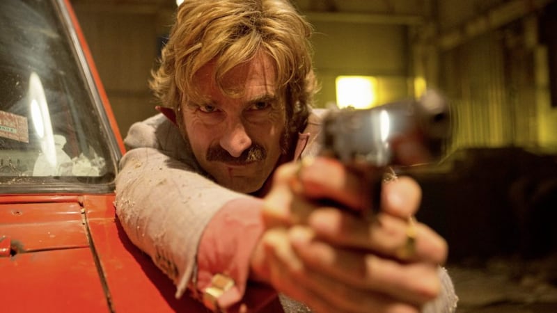 Sharlto Copley stars as the vain and vile arms dealer Vern in Free Fire 