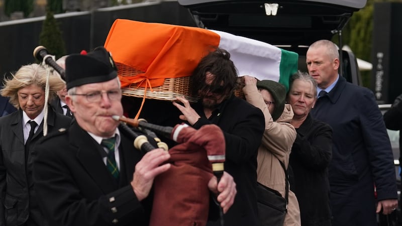 The coffin of veteran republican Rose Dugdale is carried to the Crematorium Chapel in Glasnevin, Dublin