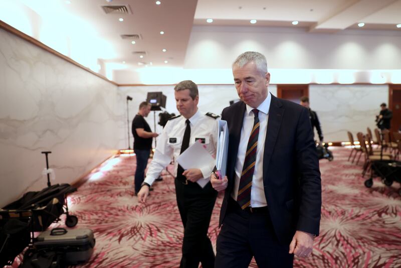 Chief Constable Jon Boutcher (right) and Temporary Deputy Chief Constable Chris Todd, leave the press conference at Stormont Hotel in Belfast following the publication of the Operation Kenova Interim Report into Stakeknife, the British Army’s top agent inside the IRA in Northern Ireland during the Troubles