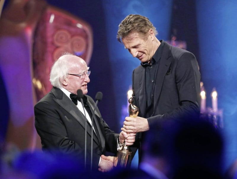 The Ballymena actor received the award for Outstanding Contribution to Cinema from President Michael D Higgins at the 2016 IFTA Irish Film and Drama awards in the Mansion House in Dublin. Picture by PA 