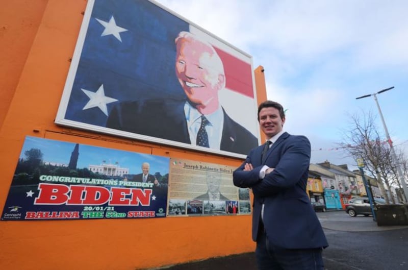 &nbsp;Mark Duffy, County Councillor for Ballina, stands in front of a mural of President-elect Joe Biden in Ballina, Co Mayo, to mark Mr. Biden's inauguration as the 46th President of the United States. President elect Biden has ancestral links to the area on the West coast of Ireland as well as on the Cooley Peninsula in Co. Louth, on the East coast.