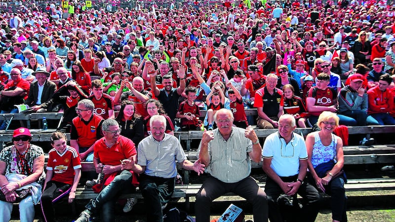 Fans enjoy the Clones sunshine ahead of Sunday's Ulster senior final