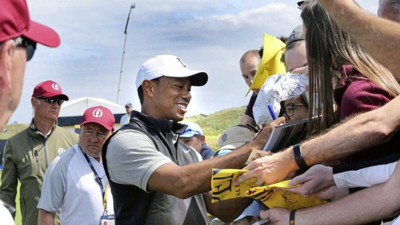 Tiger Woods signs autographs during practice for The Open at Royal Portrush on Tuesday Picture by Margaret McLaughlin 