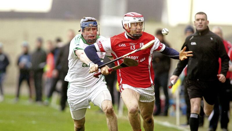 4/12/2016 Cualas  con o callaghan   comes under pressure from O Loughlin Gaels andy kearns   in yesterdays Club Hurling Final at Portlaoise pic seamus loughran 