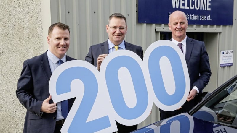 Crash Services&#39; chief executive Jonathan McKeown (centre) with sales &amp; marketing director Tony McKeown (left) and fleet &amp; repair director Paul Cooney 