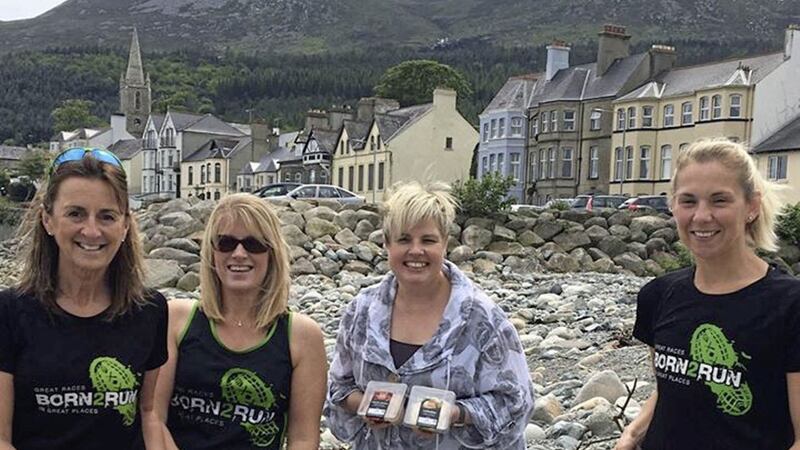 Mourne athlete Laura Graham and Country Kitchen marketing manager, Dawn Cann, help launch Country Kitchen SEA2SKY in Newcastle with Carol McMenamin and Jane Rowe from Born2Run 