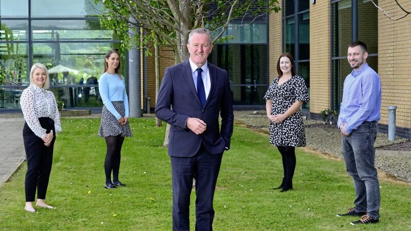 Finance Minister Conor Murphy (centre) with some current EO1 and EO2 grade civil servants (L - R): Jill McKendry, Louise Boyd, Debra Rice and Shaun Buchanan). 