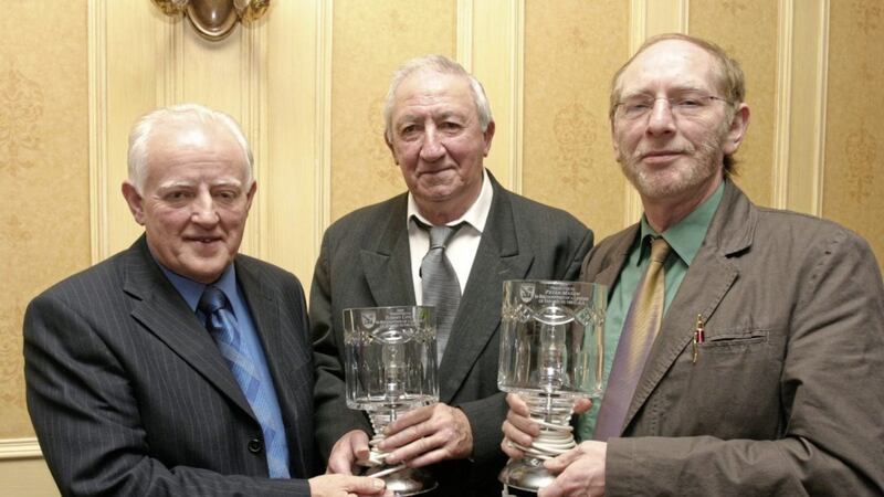The late Armagh County Chairman Joe Jordan (left) presents Tommy Lynch (centre) with the Hall of Fame award in 2005 for his outstanding contribution to the GAA. Also receiving an award is the author of this article, Peter Makem (right).