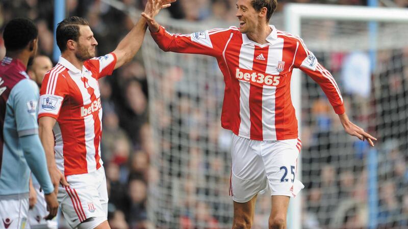 Stoke City's Peter Crouch played for Spurs between 2009 and '11, but will be pulling no punches when they go head-to-head at the Britannia Stadium on Monday<br />Picture by PA