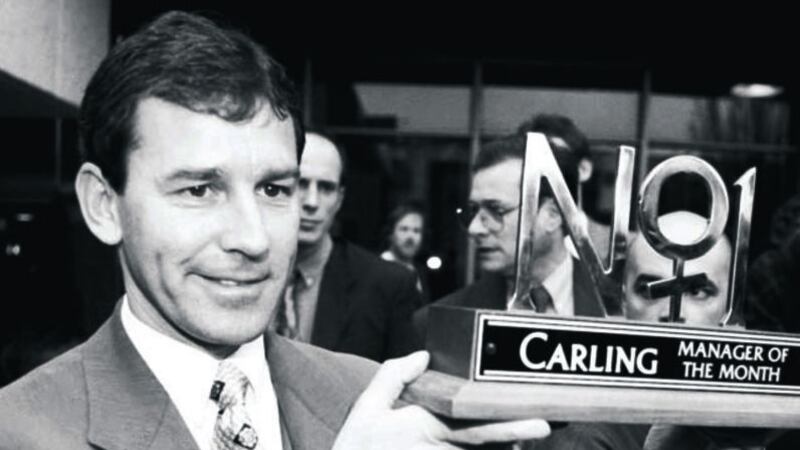 MIXED EMOTIONS.....Middlesborough boss Bryan Robson receives his Manager of the Month award after seeing his side lose its appeal against the deduction of Premiership points for not fulfilling a fixture. Boro are now likely to appeal the decision&nbsp;