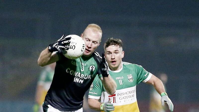 Blackhill&#39;s Donal Courtney and Buncrana&#39;s Darrach O&#39;Connor in action during the Ulster Club Junior Football Club Championship Final. Pic Philip Walsh. 