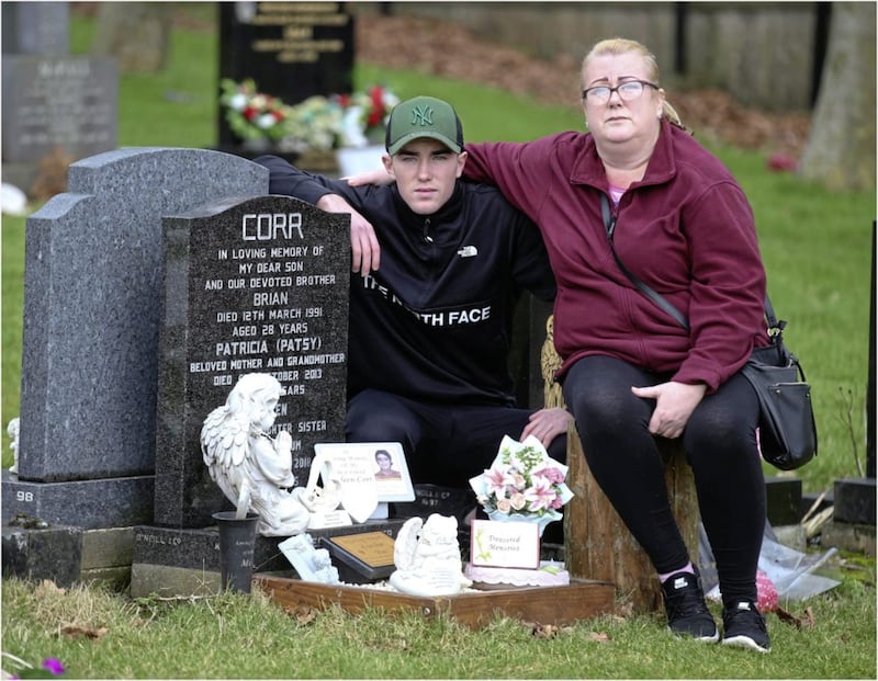 Carol Corr pictured with her son, Jim at her daughter, Joleen&#39;s grave in the city cemetery in Belfast. Picture: Hugh Russell 