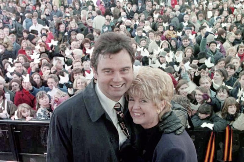 Eamonn Holmes and Gloria Hunniford host a peace rally at Belfast City Hall in 1996 