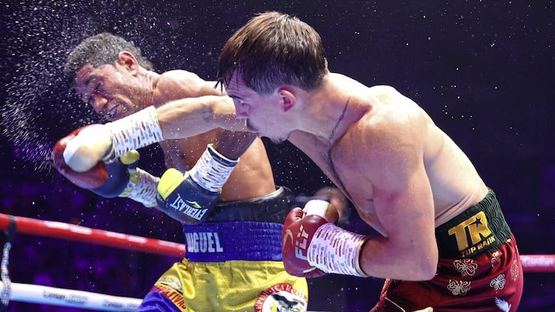 Michael Conlan lands a right hook as Miguel Marriaga rakes evasive action at the SSE Arena in August 