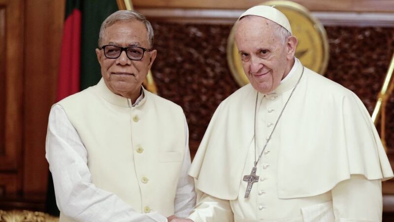Pope Francis shakes hands with President Abdul Hamid upon his arrival at the presidential palace in Dhaka, Bangladesh PICTURE: Andrew Medichini/AP 