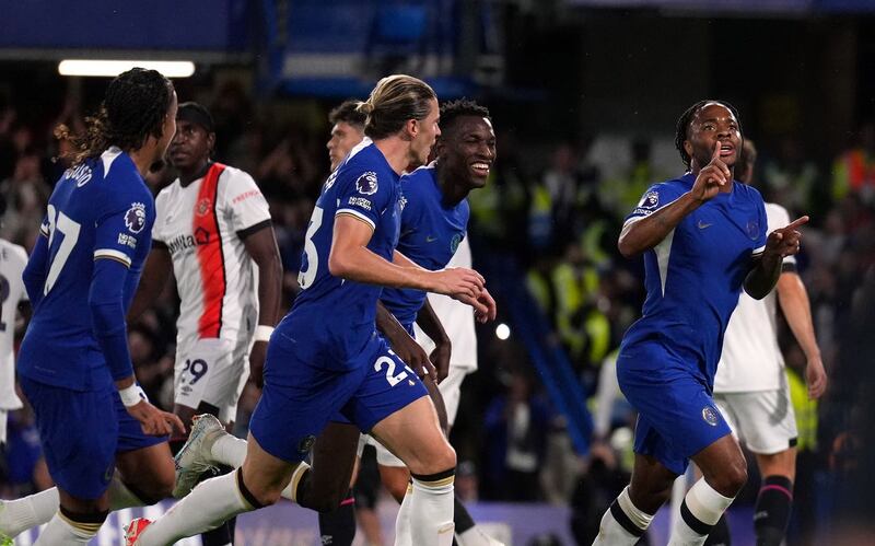 Raheem Sterling, right, celebrates scoring Chelsea’s first goal