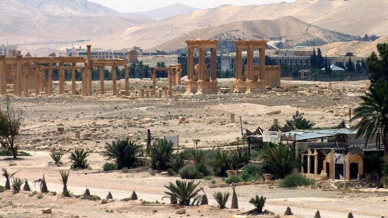 
              
FILE - This file photo released on Sunday, May 17, 2015, by the Syrian official news agency SANA, shows the general view of the ancient Roman city of Palmyra, northeast of Damascus, Syria. Activists say Islamic State militants have destroyed a temple at Syria's ancient ruins of Palmyra. News that the militants blew up the Baalshamin Temple came after the extremists beheaded Palmyra scholar Khaled al-Asaad on Tuesday, hanging his bloodied body from a pole in the town's main square. (SANA via AP, File)
            

