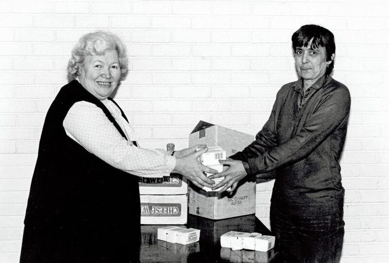 Mary McMullan (left) receives the first delivery of &#39;EEC&#39; butter from Patsy Mallon 