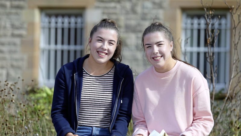 Twins Amy and Megan Wilkinson leave St Dominics with four A* each. Picture by Mal McCann 