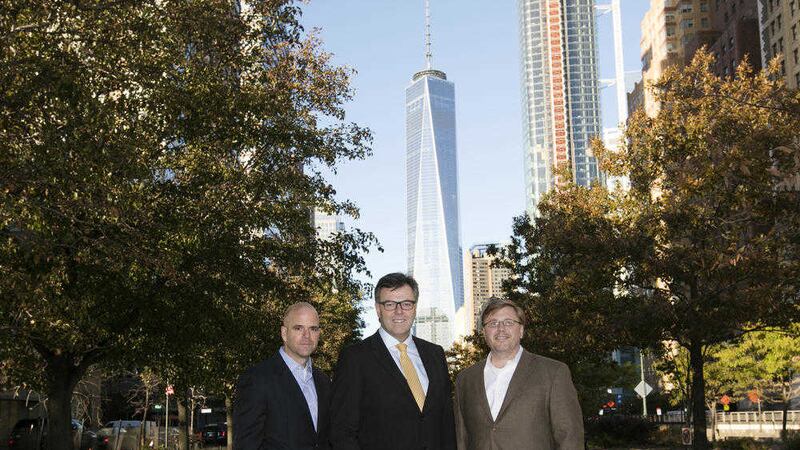 New York based financial services technology company, Hanweck Associates, is establishing its European HQ in Belfast. Pictured, centre, is Alastair Hamilton, Invest NI, with, from left, Michael Hollingsworth and Gerald Hanweck, Hanweck Associates. 