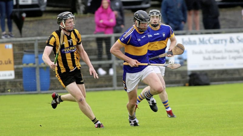Rossa&#39;s Stephen Beatty in action against Ballycastle&#39;s Eamon Elliott. Beatty was one of the star performers in Rossa&#39;s victory yesterday Picture: Seamus Loughran. 