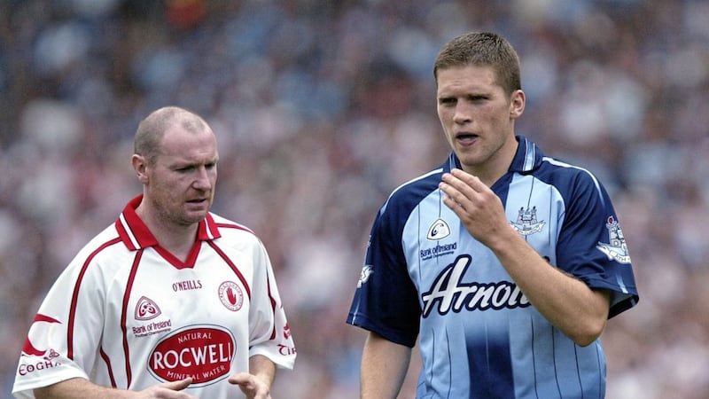 Tyrone legend Chris Lawn sizes up Dublin's Conal Keaney. Picture by Seamus Loughran