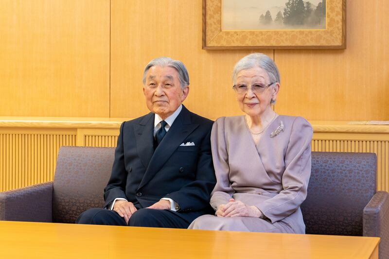 Japan’s former Emperor Akihito and Empress Michiko pose during a New Year photo session at their residence in Tokyo in December 2023 (Imperial Household Agency of Japan/AP)