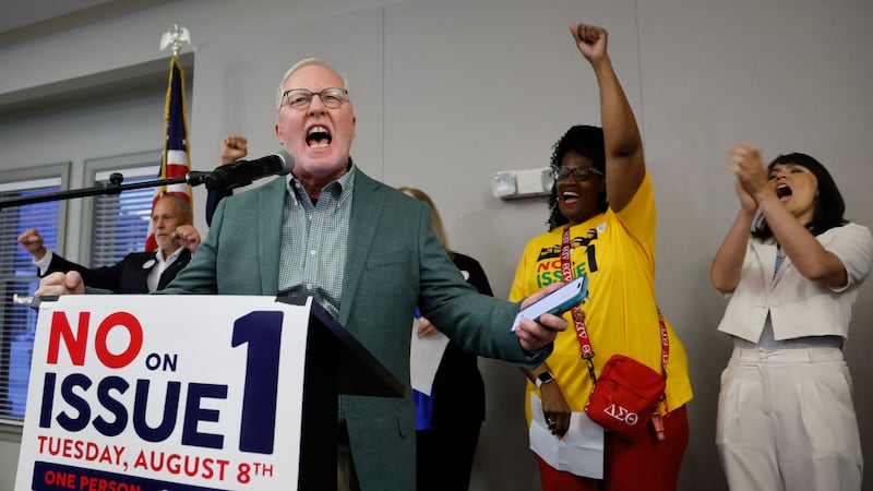 Dennis Willard, spokesperson for One Person One Vote, celebrates the results of the election (AP Photo/Jay LaPrete)