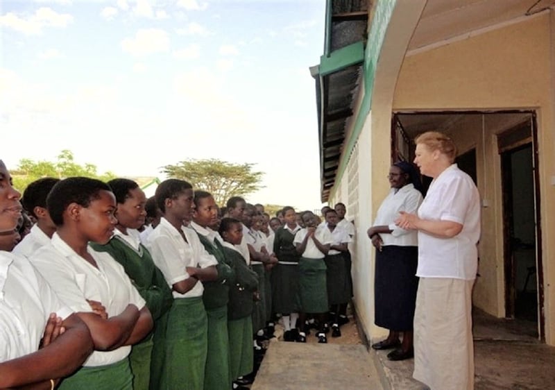 Sister Mary McHugh, who spent most of her ministry in Kenya, addresses students in 2011 at Turkana Girls Secondary School, Lodwar. It was the first secondary school for girls in the Turkana Desert. Also pictured is Sr Florence Nabwire, principal. Sr Mary is retired and lives in Ireland. Picture courtesy of Ursuline sisters in Ireland, Kenya. 