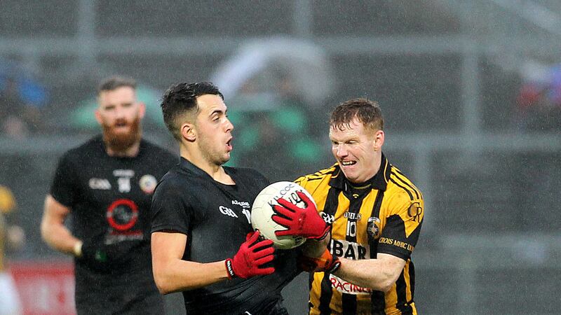 Kilcoo's Ryan Johnston holds off Crossmaglen's Michael McNamee during last Sunday's Ulster Club SFC semi-final at P&aacute;irc Esler <br />Picture by Philip Walsh&nbsp;