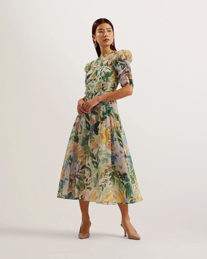 Woman wearing a long floral dress
