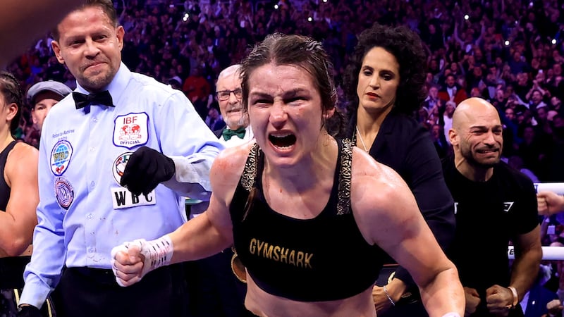 Katie Taylor celebrates Saturday night's momentous victory over English rival Chantelle Cameron. Picture by PA