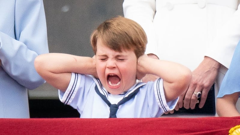 The four-year-old royal chatted to the Queen and covered his ears during the flypast.