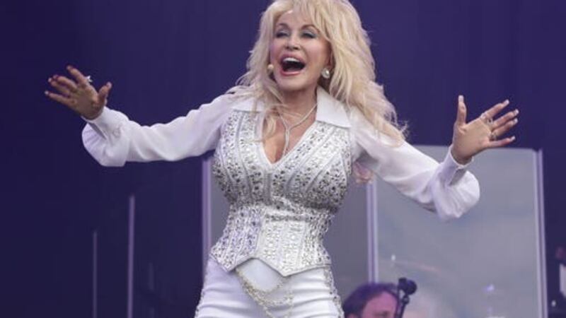 Dolly Parton took to the Pyramid Stage in 2014 (Yui Mok/PA)